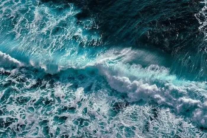 Framed Print : Aerial view to ocean waves. Blue water background Framed Print : Aerial view to ocean waves. Blue water background