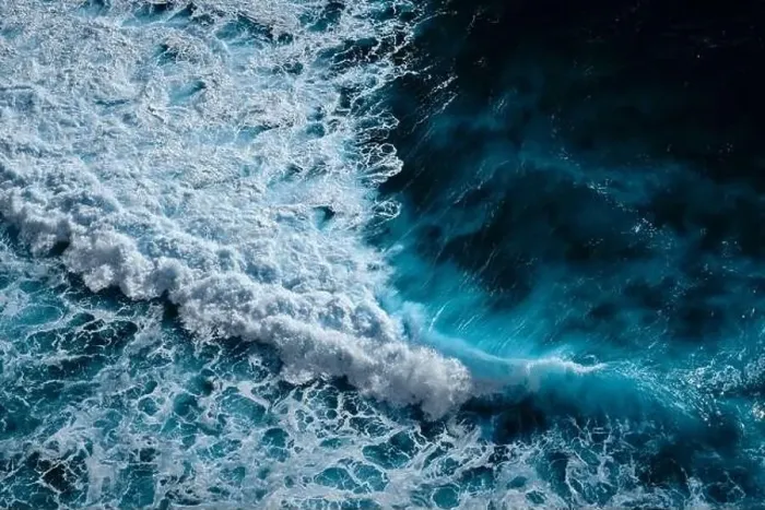 Framed Print : Aerial view to ocean waves. Blue water background Framed Print : Aerial view to ocean waves. Blue water background