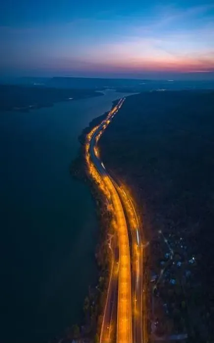 Framed Print : aerial view orange lights on the expressway along the route along the Lam Ta Khong Dam Framed Print : aerial view orange lights on the expressway along the route along the Lam Ta Khong Dam