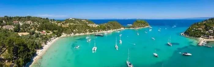 Framed Print : Aerial view of Paralia Lakka beach near the seaside village of Lakka on the north coast of Paxos, Ionian Islands, Greece Framed Print : Aerial view of Paralia Lakka beach near the seaside village of Lakka on the north coast of Paxos, Ionian Islands, Greece