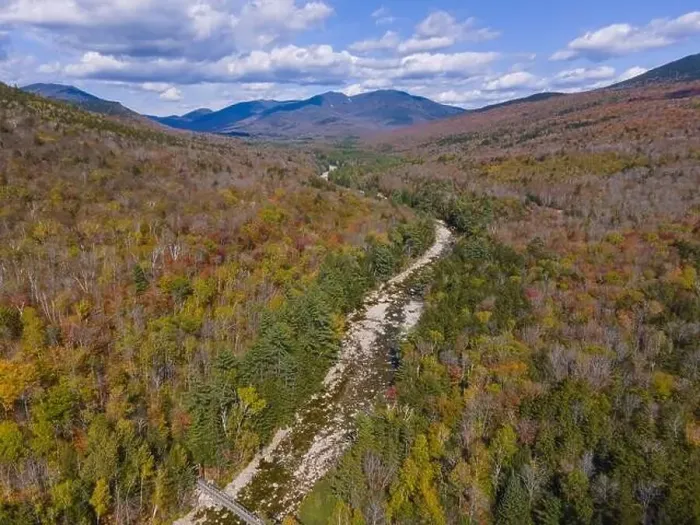 Framed Print : Aerial view of Pemigewasset River valley with fall foliage near Lincoln Woods on Kancamagus Highway in White Mountain Framed Print : Aerial view of Pemigewasset River valley with fall foliage near Lincoln Woods on Kancamagus Highway in White Mountain