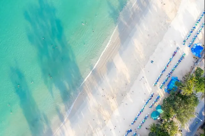Framed Print : Aerial view of people swimming on the pink swim ring in the transparent turquoise sea in Phuket, Thailand Framed Print : Aerial view of people swimming on the pink swim ring in the transparent turquoise sea in Phuket, Thailand