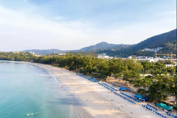 Framed Print : Aerial view of people swimming in the transparent turquoise sea at Karon beach in Phuket, Thailand Framed Print : Aerial view of people swimming in the transparent turquoise sea at Karon beach in Phuket, Thailand
