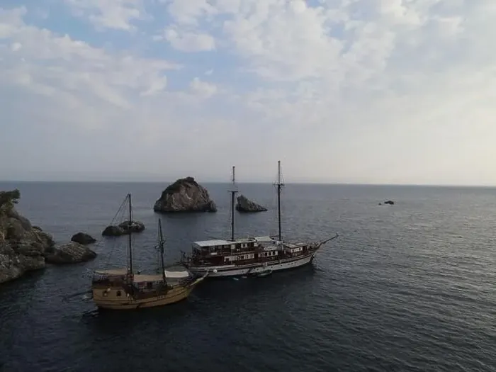 Framed Print : Aerial View Pirate Ships Near Island Of Panagia In Famous Tourist Destination Parga Town The Greek Caribbean Of Epirus Framed Print : Aerial View Pirate Ships Near Island Of Panagia In Famous Tourist Destination Parga Town The Greek Caribbean Of Epirus