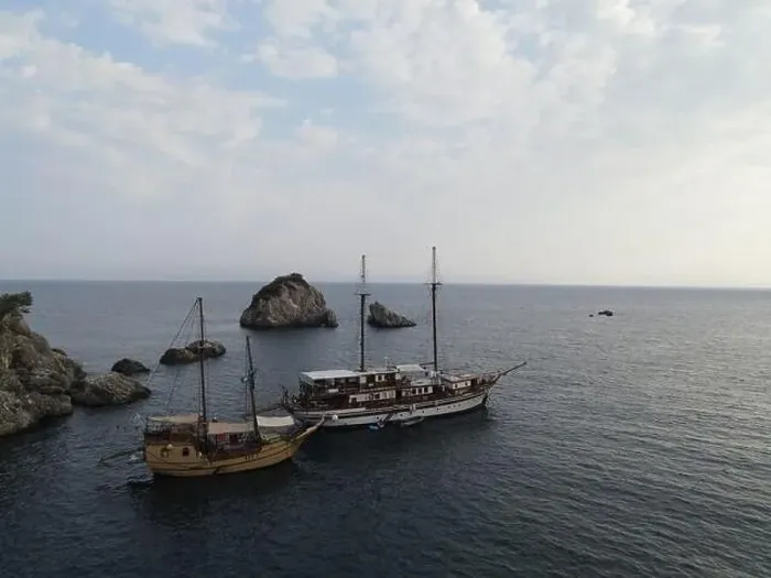 Framed Print : Aerial View Pirate Ships Near Island Of Panagia In Famous Tourist Destination Parga Town The Greek Caribbean Of Epirus Framed Print : Aerial View Pirate Ships Near Island Of Panagia In Famous Tourist Destination Parga Town The Greek Caribbean Of Epirus
