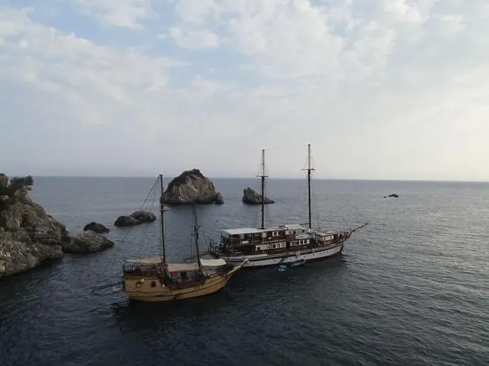 Framed Print : Aerial View Pirate Ships Near Island Of Panagia In Famous Tourist Destination Parga Town The Greek Caribbean Of Epirus Framed Print : Aerial View Pirate Ships Near Island Of Panagia In Famous Tourist Destination Parga Town The Greek Caribbean Of Epirus