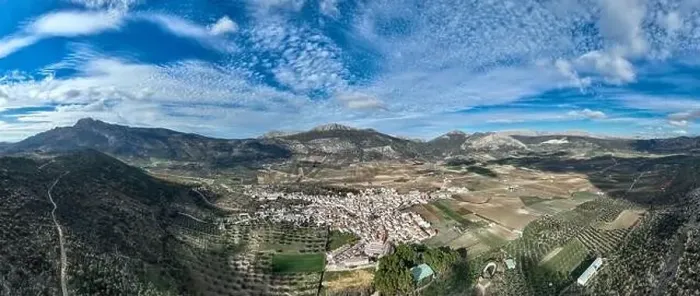 Framed Print : aerial view of the pretty white village of Alfarnate in the province of Malaga, Spain Framed Print : aerial view of the pretty white village of Alfarnate in the province of Malaga, Spain
