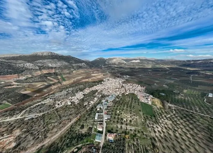 Framed Print : aerial view of the pretty white village of Alfarnate in the province of Malaga, Spain Framed Print : aerial view of the pretty white village of Alfarnate in the province of Malaga, Spain