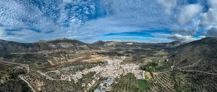 Framed Print : aerial view of the pretty white village of Alfarnate in the province of Malaga, Spain Framed Print : aerial view of the pretty white village of Alfarnate in the province of Malaga, Spain