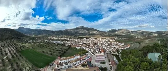 Framed Print : aerial view of the pretty white village of Alfarnate in the province of Malaga, Spain Framed Print : aerial view of the pretty white village of Alfarnate in the province of Malaga, Spain