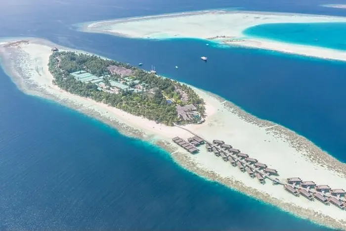 Framed Print : Aerial view of resort water bungalows. Luxury tropical hotel over coral reef connected with atolls in Indian ocean. Amazing travel landscape Framed Print : Aerial view of resort water bungalows. Luxury tropical hotel over coral reef connected with atolls in Indian ocean. Amazing travel landscape