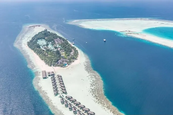 Framed Print : Aerial view of resort water bungalows. Luxury tropical hotel over coral reef connected with atolls in Indian ocean. Amazing travel landscape Framed Print : Aerial view of resort water bungalows. Luxury tropical hotel over coral reef connected with atolls in Indian ocean. Amazing travel landscape