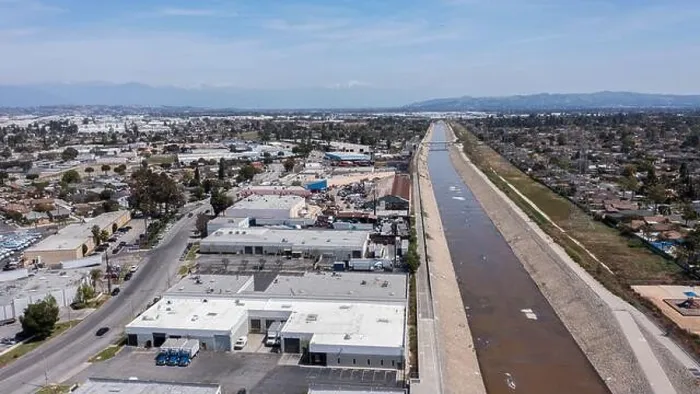 Framed Print : Aerial view of the Rio Hondo River as it flows through Downey and Bell Gardens, California, USA Framed Print : Aerial view of the Rio Hondo River as it flows through Downey and Bell Gardens, California, USA