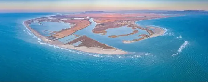 Framed Print : Aerial view of the river mouth in the Ebro Delta at sunrise (Tarragona) Framed Print : Aerial view of the river mouth in the Ebro Delta at sunrise (Tarragona)