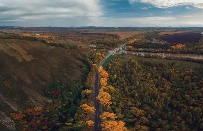 Framed Print : Aerial view of road in beautiful autumn altai forest Framed Print : Aerial view of road in beautiful autumn altai forest