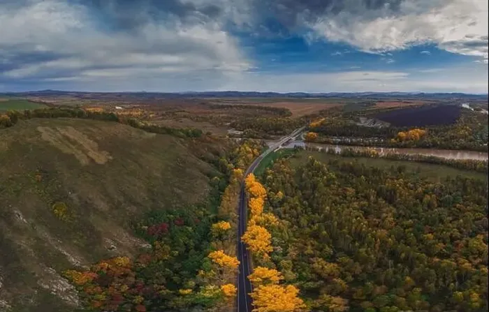 Framed Print : Aerial view of road in beautiful autumn altai forest Framed Print : Aerial view of road in beautiful autumn altai forest