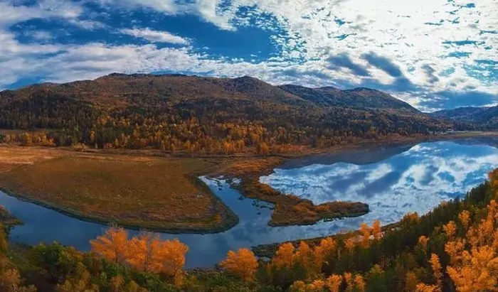 Framed Print : Aerial view of road in beautiful autumn Altai forest Framed Print : Aerial view of road in beautiful autumn Altai forest