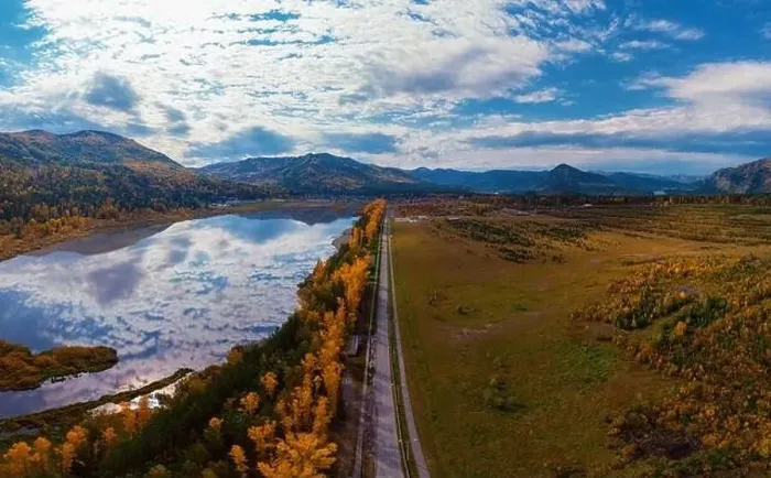 Framed Print : Aerial view of road and lake in beautiful autumn Altai forest Framed Print : Aerial view of road and lake in beautiful autumn Altai forest