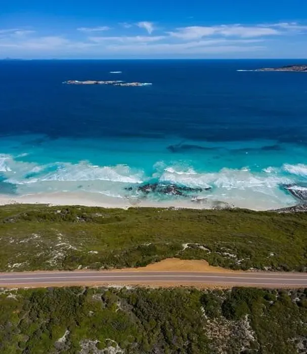 Framed Print : Aerial view of the empty road beside the ocean at Ten Mile Lagoon in Esperance, Western Australia Framed Print : Aerial view of the empty road beside the ocean at Ten Mile Lagoon in Esperance, Western Australia