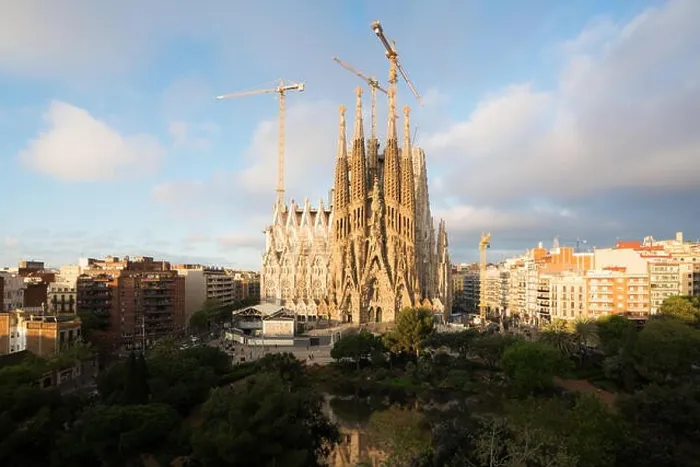 Framed Print : Aerial view of the Sagrada Familia, a large Roman Catholic church in Barcelona, Spain, designed by Catalan architect Antoni Gaudi Framed Print : Aerial view of the Sagrada Familia, a large Roman Catholic church in Barcelona, Spain, designed by Catalan architect Antoni Gaudi