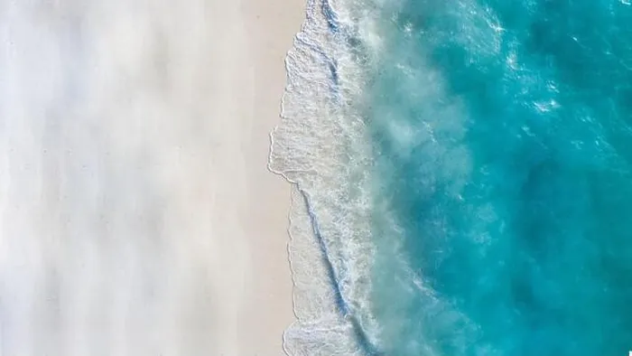 Framed Print : Aerial view of sandy beach and ocean with waves. Beautiful tropical white empty beach and sea waves seen from above. Beautiful sea landscape beach Framed Print : Aerial view of sandy beach and ocean with waves. Beautiful tropical white empty beach and sea waves seen from above. Beautiful sea landscape beach