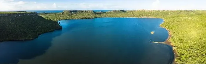 Framed Print : Aerial view above scenery of Curacao, Caribbean with ocean, coast, hills, lake Framed Print : Aerial view above scenery of Curacao, Caribbean with ocean, coast, hills, lake