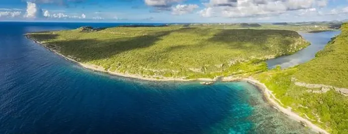 Framed Print : Aerial view above scenery of Curacao, Caribbean with ocean, coast, hills, lake Framed Print : Aerial view above scenery of Curacao, Caribbean with ocean, coast, hills, lake