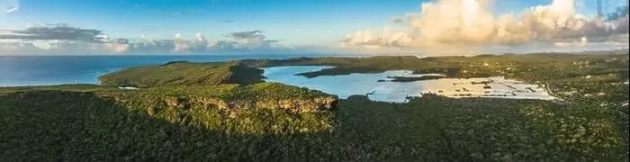 Framed Print : Aerial view above scenery of Curacao, Caribbean with ocean, coast, hills, lake Framed Print : Aerial view above scenery of Curacao, Caribbean with ocean, coast, hills, lake