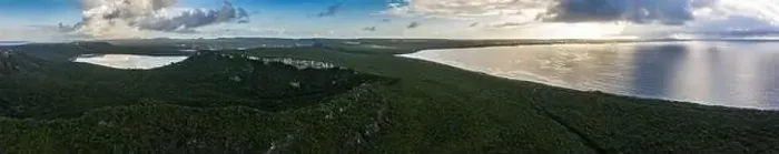 Framed Print : Aerial view above scenery of Curacao, Caribbean with ocean, coast, hills, lake Framed Print : Aerial view above scenery of Curacao, Caribbean with ocean, coast, hills, lake