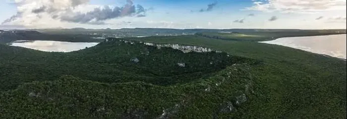 Framed Print : Aerial view above scenery of Curacao, Caribbean with ocean, coast, hills, lake Framed Print : Aerial view above scenery of Curacao, Caribbean with ocean, coast, hills, lake