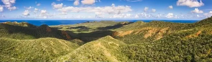 Framed Print : Aerial view above scenery of Curacao, Caribbean with ocean, coast, hills, lake Framed Print : Aerial view above scenery of Curacao, Caribbean with ocean, coast, hills, lake