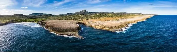 Framed Print : Aerial view above scenery of Curacao, Caribbean with ocean, coast, hills, lake Framed Print : Aerial view above scenery of Curacao, Caribbean with ocean, coast, hills, lake