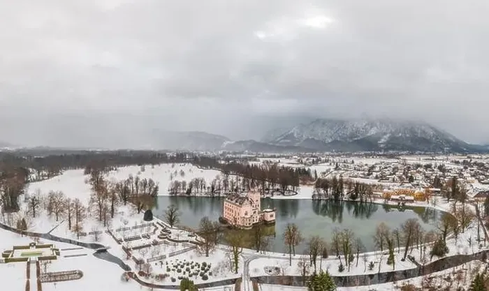 Framed Print : Aerial view of Schloss Anif moated castle in artificial pond Salzburg outskirts in heavy snow view of untersberg Framed Print : Aerial view of Schloss Anif moated castle in artificial pond Salzburg outskirts in heavy snow view of untersberg