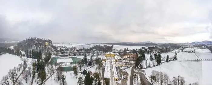 Framed Print : Aerial view of Schloss Hellbrunn covered in snow near Salzburg outskirts in winter time