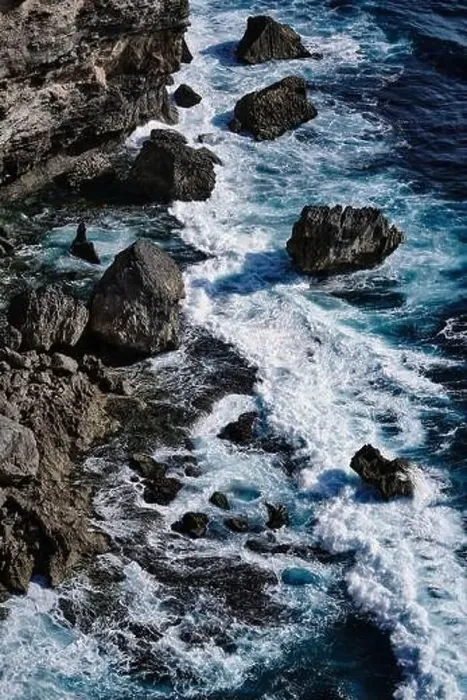 Framed Print : Aerial view to sea landscape, water with waves and rocks. Dramatic colors photo Framed Print : Aerial view to sea landscape, water with waves and rocks. Dramatic colors photo