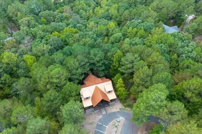 Framed Print : Aerial view of secluded cottage in the woods. Cabin in the forest in Broken Bow, Oklahoma USA Framed Print : Aerial view of secluded cottage in the woods. Cabin in the forest in Broken Bow, Oklahoma USA