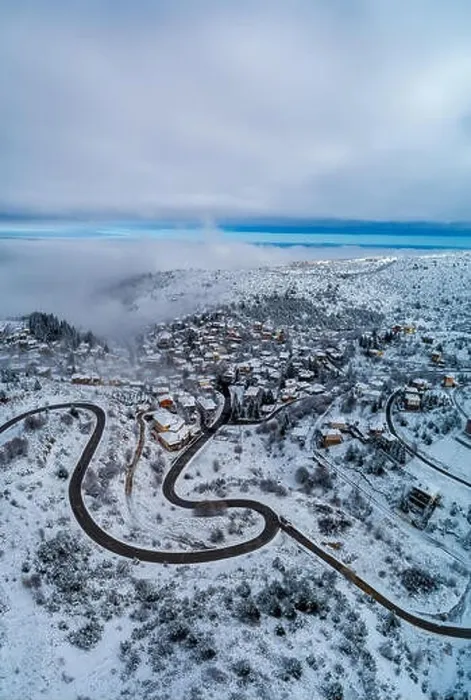 Framed Print : Aerial View of Seli Traditional Greek Village Covered by Snow in Winter Morning Framed Print : Aerial View of Seli Traditional Greek Village Covered by Snow in Winter Morning