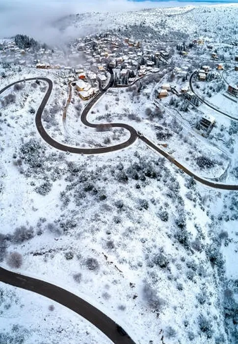 Framed Print : Aerial View of Seli Traditional Greek Village Covered by Snow in Winter Morning Framed Print : Aerial View of Seli Traditional Greek Village Covered by Snow in Winter Morning
