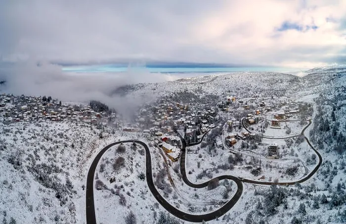 Framed Print : Aerial View of Seli Traditional Greek Village Covered by Snow in Winter Morning Framed Print : Aerial View of Seli Traditional Greek Village Covered by Snow in Winter Morning
