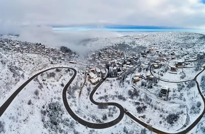 Framed Print : Aerial View of Seli Traditional Greek Village Covered by Snow in Winter Morning Framed Print : Aerial View of Seli Traditional Greek Village Covered by Snow in Winter Morning