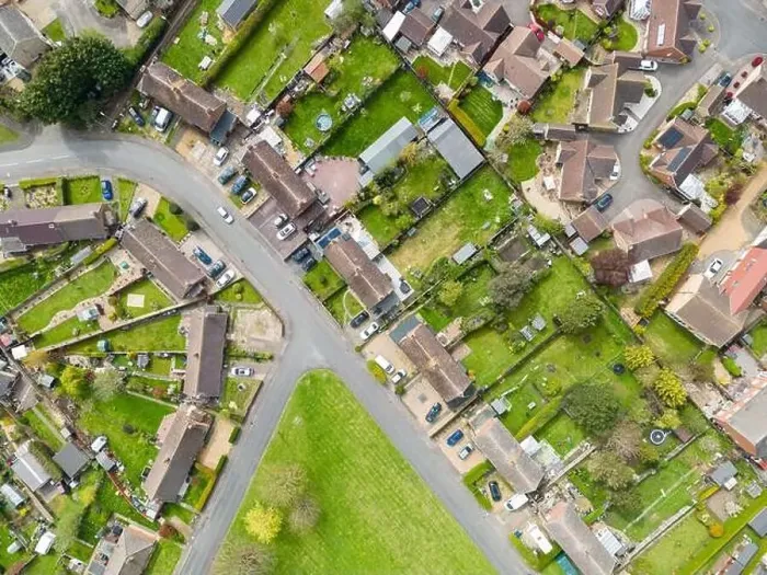 Framed Print : aerial top down view of mostly semi detached houses seen in a typical English village Framed Print : aerial top down view of mostly semi detached houses seen in a typical English village