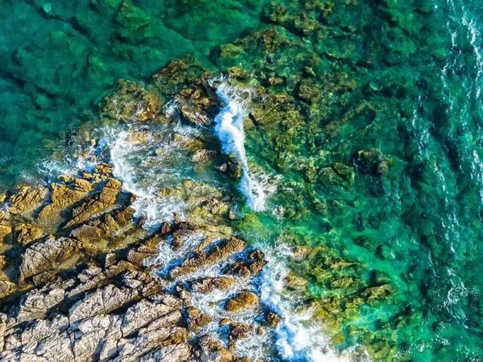 Framed Print : Aerial view of sharp rocks on Punta Planka, Croatia, splashed with waves creating white foam Framed Print : Aerial view of sharp rocks on Punta Planka, Croatia, splashed with waves creating white foam