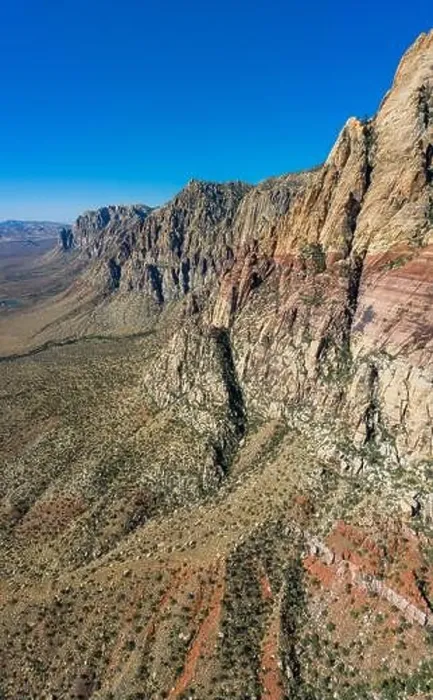 Framed Print : An aerial view shows a rugged mountain landscape that rises from the desert surrounding Las Vegas, Nevada. This dry area averages over 95 degrees F Framed Print : An aerial view shows a rugged mountain landscape that rises from the desert surrounding Las Vegas, Nevada. This dry area averages over 95 degrees F