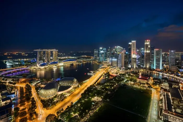 Framed Print : Aerial view of Singapore business district and city at twilight in Singapore, Asia Framed Print : Aerial view of Singapore business district and city at twilight in Singapore, Asia