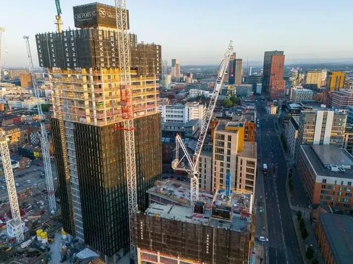 Framed Print : Aerial view of a skyscraper under construction on Ancoats area, Manchester UK Framed Print : Aerial view of a skyscraper under construction on Ancoats area, Manchester UK
