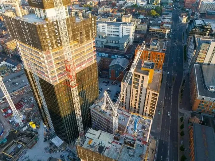 Framed Print : Aerial view of a skyscraper under construction on Ancoats area, Manchester UK Framed Print : Aerial view of a skyscraper under construction on Ancoats area, Manchester UK