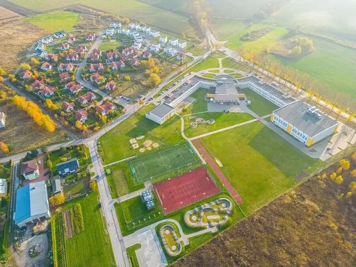 Framed Print : Aerial view of small european town with sradium and sport field, panorama Framed Print : Aerial view of small european town with sradium and sport field, panorama
