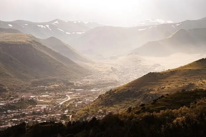 Framed Print : Aerial view of a small town or village in a mountain valley Framed Print : Aerial view of a small town or village in a mountain valley
