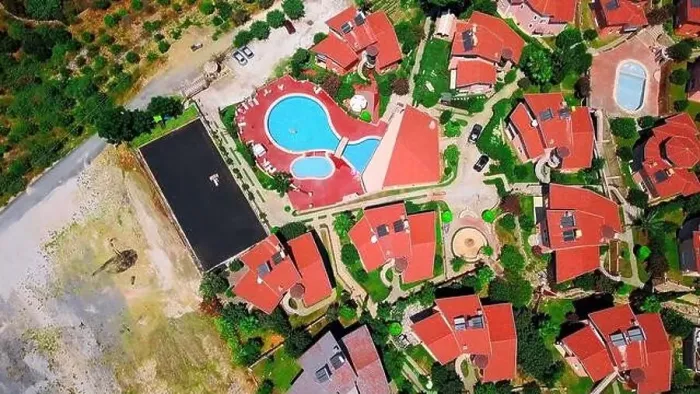 Framed Print : Aerial top view of small villas and open air swimming pool. Clip. Concept of summer holidays and tourism Framed Print : Aerial top view of small villas and open air swimming pool. Clip. Concept of summer holidays and tourism