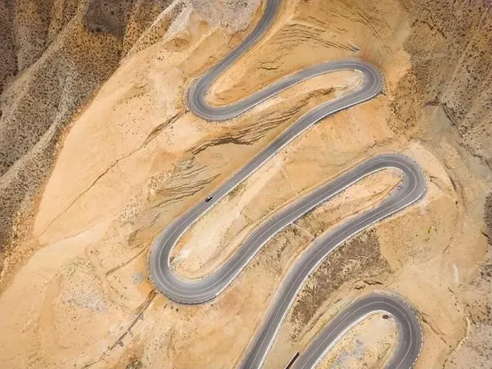 Framed Print : Top aerial view of snake curved road Framed Print : Top aerial view of snake curved road
